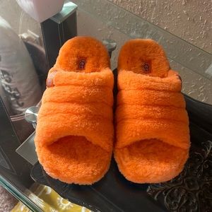 UGG ORANGE furry blue soles. Size 7 nwt
